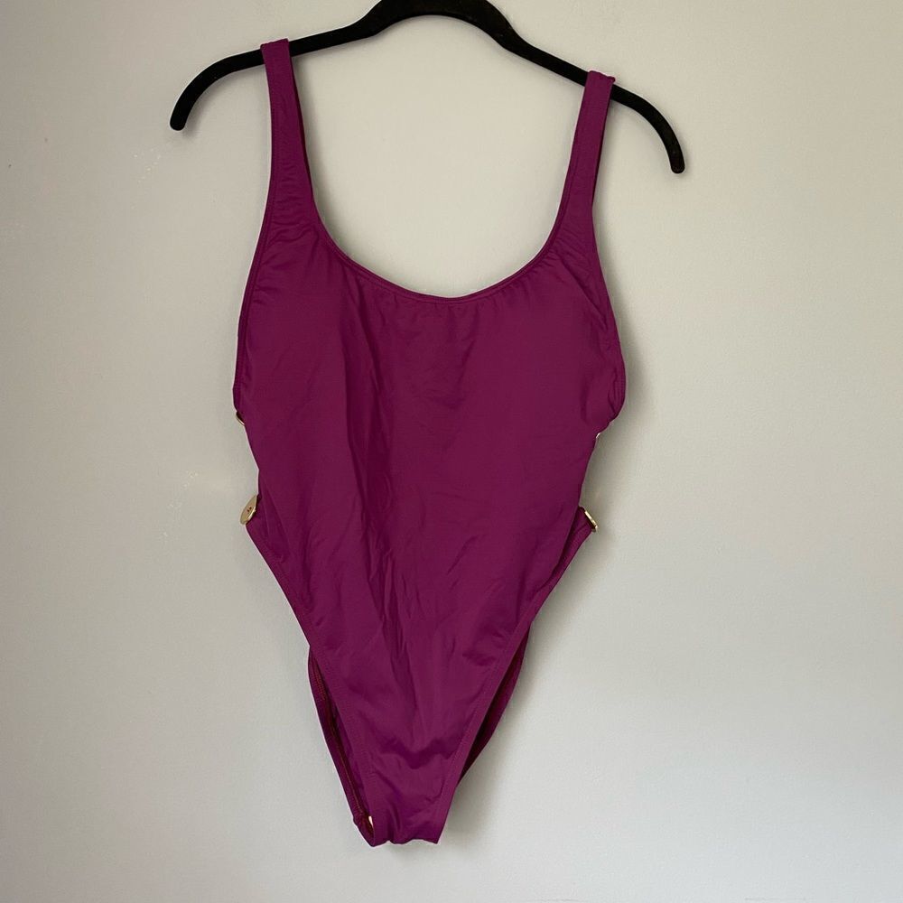LeBlanca women’s gold button side accent one piece swimsuit peekaboo cut out